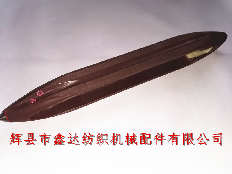 Injection molding coreless shuttle for textile equipment